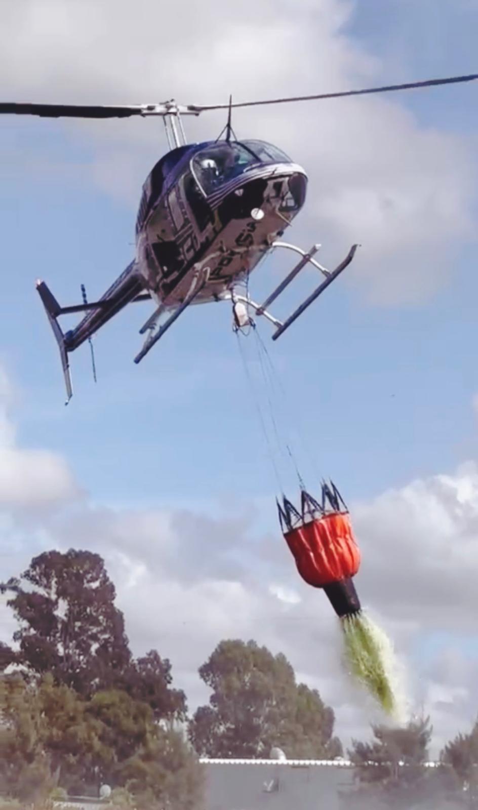 Aviación Policial apoyó con helicóptero el combate de un incendio de campo en el balneario Neptunia
